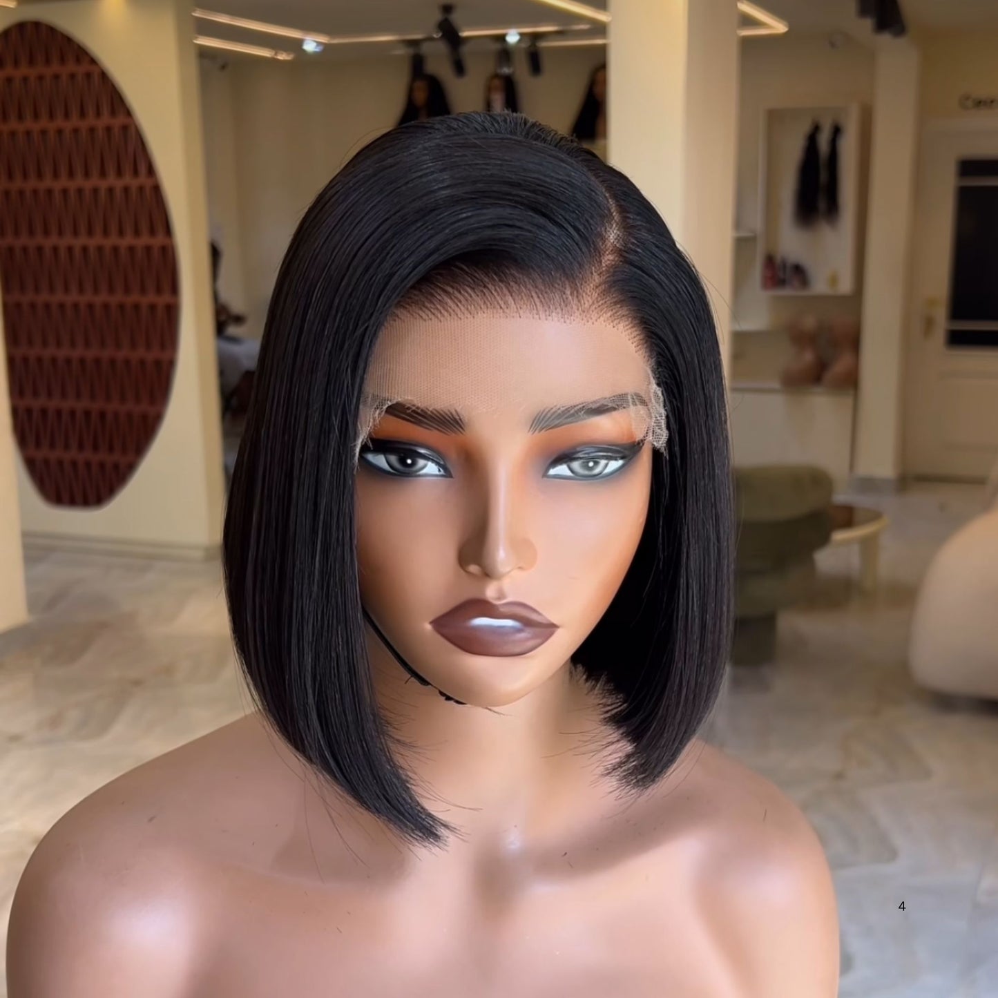 <img src="ruta-de-tu-imagen.jpg"
alt="Peluca bob negra de 20 cm con cabello natural, estilo elegante y moderno"
title="Peluca negra bob 20 cm de cabello natural – Look sofisticado">