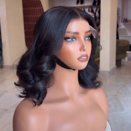<img src="ruta-de-tu-imagen.jpg" 
     alt="Peluca negra de cabello natural con ondas suaves y corte bob moderno para mujer" 
     title="Peluca de cabello natural negra ondulada con corte bob – Look elegante">
