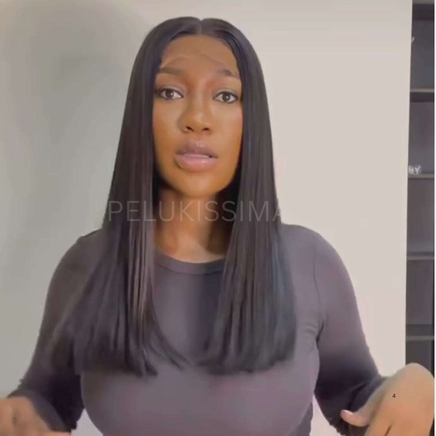 video de mer modelando peluca de cabello natural  corte bob negro 1b largo 40 cm